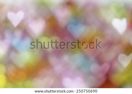 Colorful hearts bokeh background for use at graphic design