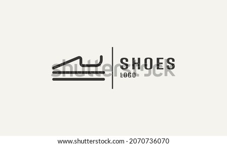 Abstract Vector logo of a shoes which is also similar to sneaker. A Simple logo for Apparel and Footwear Company.