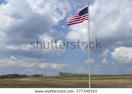 Somerset County, PA, USA - May 8, 2015 : American flag flying above the new visitors center at the Flight 93 National Memorial.