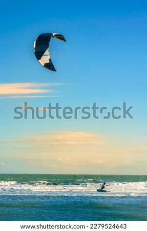 Similar – Image, Stock Photo Unrecognizable athlete practicing surfing on ocean wave