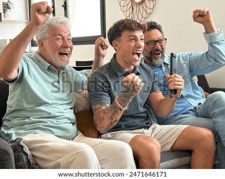 Similar – Image, Stock Photo Excited boy watching match on laptop