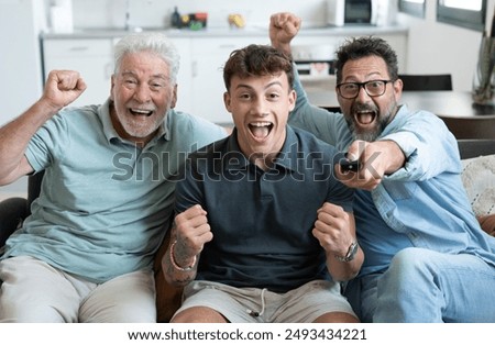 Similar – Image, Stock Photo Excited boy watching match on laptop