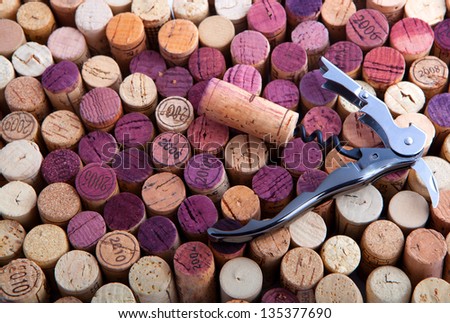 Background pattern of wine bottles corks and corkscrew