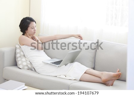 the image of Asian businesswoman and working at home