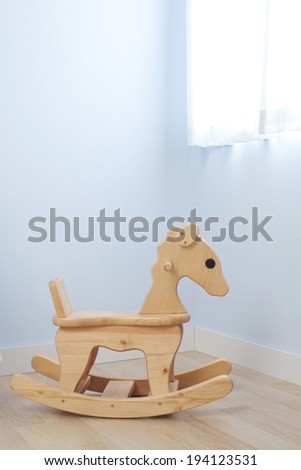the image of parenting and rocking horse