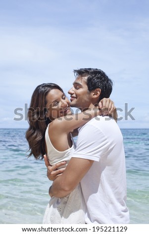 the image of couple hugging by the sea in Boracay in the Philippines