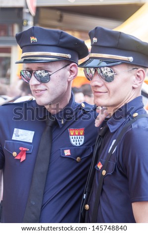 COLOGNE, GERMANY - JULY 7: costumed people at the CSD (Gay Pride Parade called Christopher Street Day) in Cologne on July 7, 2013