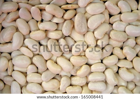 Healthy organically grown white beans background