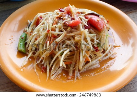 Green papaya salad or called Som tom at Thailand,thai food most found in street food