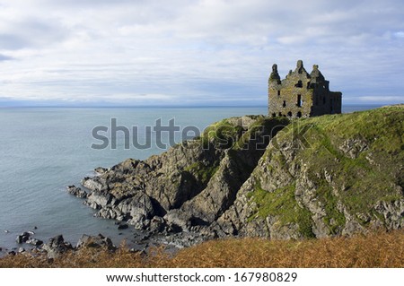 Ruined Castle looking out to sea on the cliffs on the west coast of Scotland.