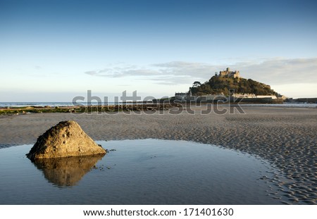 Evening Light St Michael\'s Mount , Mount\'s Bay Marazion ,Cornwall with focus point on rock in for ground.