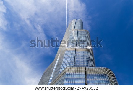 CHICAGO, USA - MAY 24, 2014: The Trump Tower with blue sky seen from Chicago River.