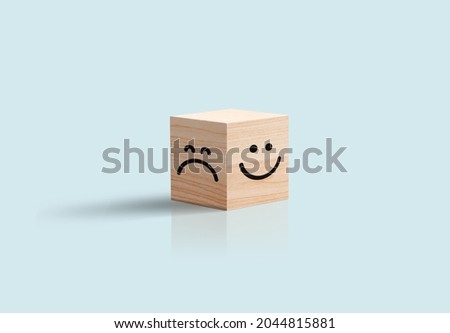 happy and sad Face In Wooden Cube Business concept. Blue background. Positive negative feedback, customer review, optimist pessimist character . 3d illustration Сток-фото © 