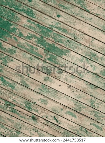 Similar – Image, Stock Photo Knotted remainder of an orange fluttering band on a rusty iron bar of a fence in front of a brown background