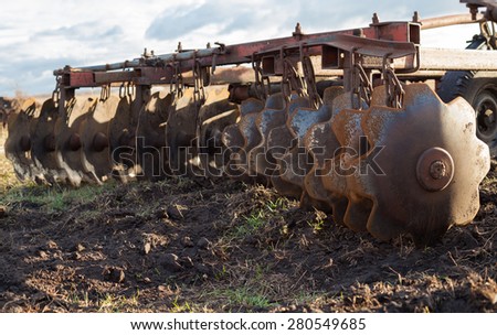 Disc harrow used to cultivate the soil. Close up.