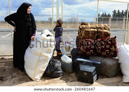 Person escaping from Syria to Turkey because of long civil war.  Syrian-turkish border in Kilis.  26/2/2014 - Kilis - Turkey