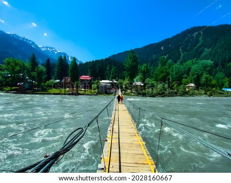 The Hanging bridge of Taobatt, Gurez Valley. This place is sub valley of Neelum Valley located in Kashmir Pakistan. The river's name is Neelum river