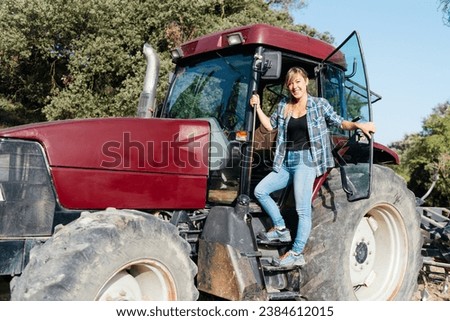 Similar – Image, Stock Photo Female farmer with tractor on olive plantation