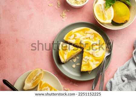 Similar – Image, Stock Photo Cheesecake slice with lemon syrup topping. Slice of cheesecake close-up