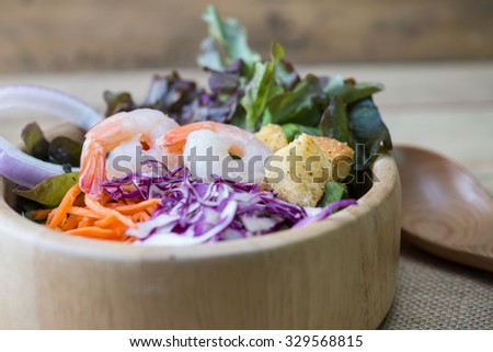 healthy green garden salad with cooked shrimp