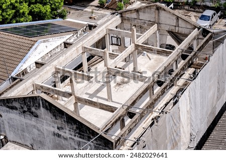 Similar – Foto Bild Verlassenes Gebäude gegen sauberen Himmel. Sowjetische modernistische Architektur, notleidende Betonhaus