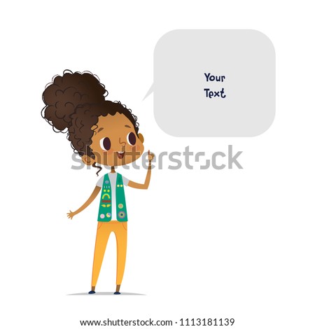 Young smiling African American girl scout dressed in uniform with badges and patches and speech bubble with place for text isolated on white background. Female scouter, member of troop, speaker.