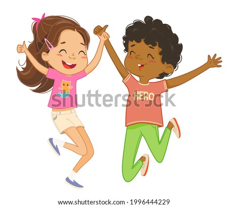 Boy and girl play together, happily jump and dance.