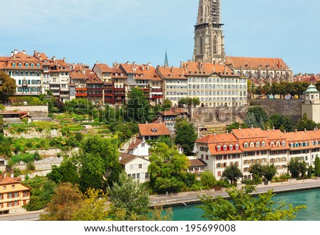 BERN, SWITZERLAND - AUGUST 24: View of the Old town and Berner Munster cathedral from the Kirchenfeldbrucke bridge on August 24, 2012 in Bern, Switzerland.