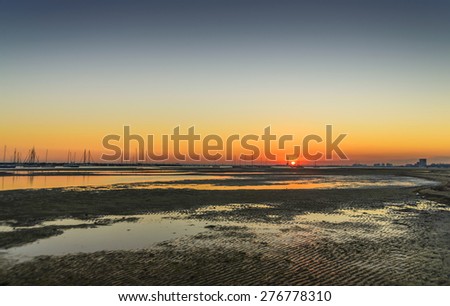 red sky sunset low tide
