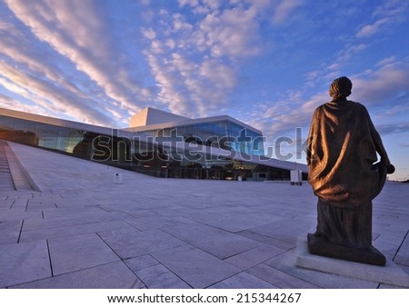 OSLO, NORWAY - SEPTEMBER 28: National Oslo Opera House shines at sunrise on September 28, 2013. Oslo Opera House was opened on April 12, 2008 in Oslo, Norway