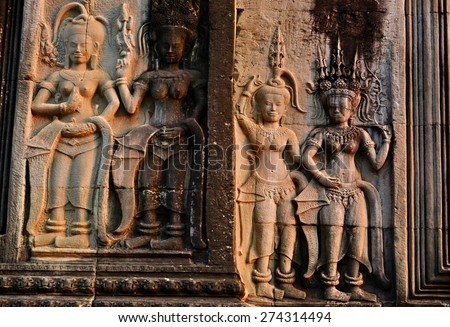 Dancing Apsaras an old Khmer art carvings on the wall in Ta Prohm Temple,Siem Reap, Cambodia.