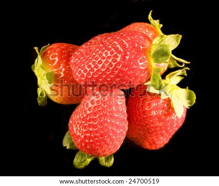 Fresh Strawberries on black ground