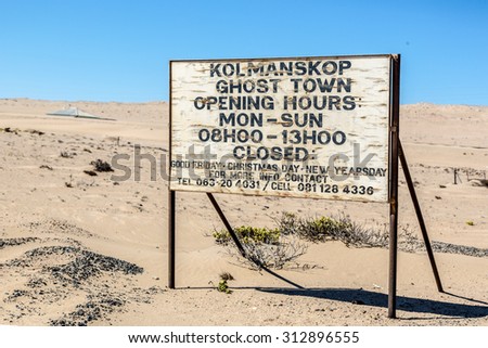 Welcome sign in Kolmanskop City, the ghost city near by Luderitz, Namibia