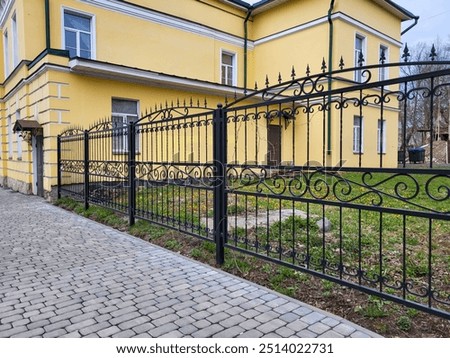 Similar – Image, Stock Photo The cast iron banister conjures up a bizarre shadow on the terrazzo steps
