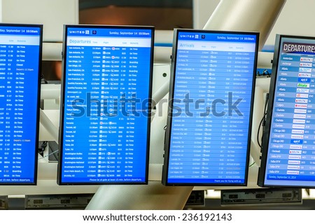 September 12, 2014: IAH, Houston Intercontinental Airport, Houston, T, USA - Flight information display screens