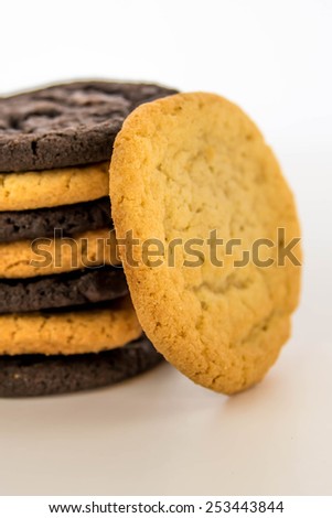 stacked chocolate and sugar cookies