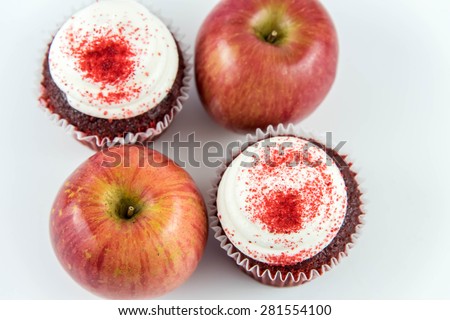 red apple vs red velvet cupcake - snack decision between healthy food or junk food