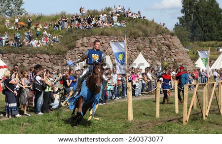 VYBORG, RUSSIA - AUGUST 17, 2013: Photo of Equestrian tournament of knights.