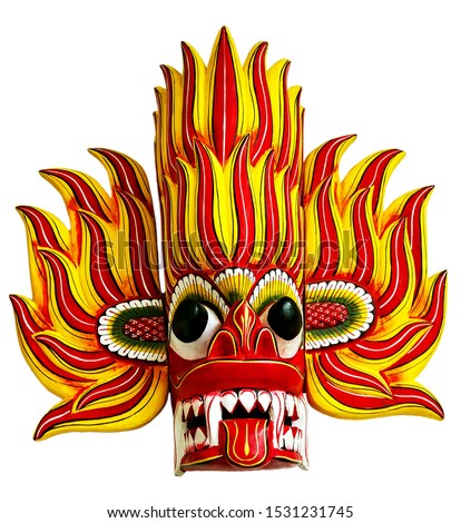Traditional Asian Handmade Wood Sri Lanka Mask head Gini Raksha Fire Devil Ceylon Art Sculpture isolated on white background