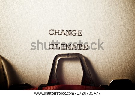 Change climate text written with a typewriter.
