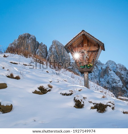Mountain cross of Gardena mountain pass of Dolomites mountain range of Italy, Europe, Unesco World Heritage Site 