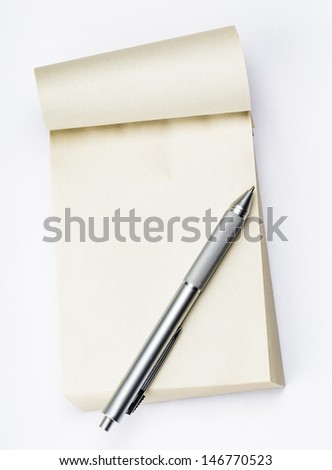 Blank memo pad with pen