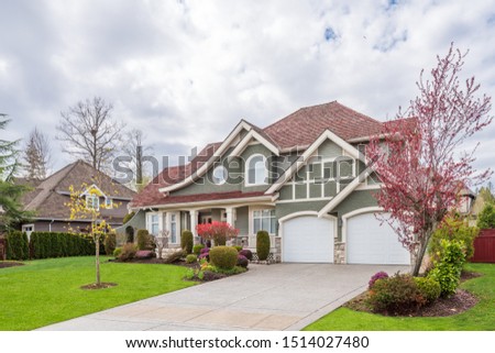 Houses in suburb at Summer in the north America. Luxury houses with nice landscape.