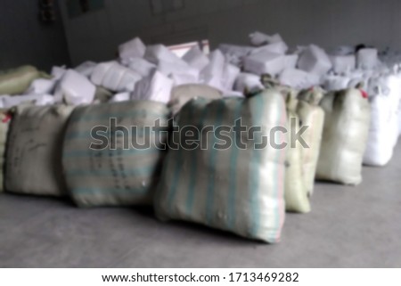 Lots of bags in stock, blurred defocused background