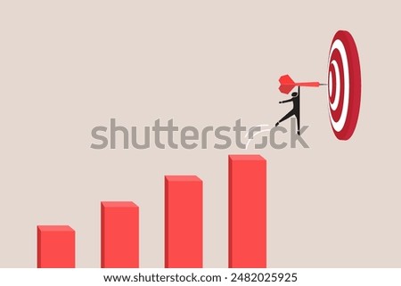 Businessman jump with arrow to target and successfully. advancement in career or business growth concept. Aspiration and motivation