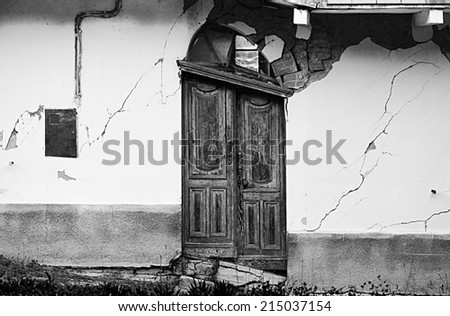 Ruined door caused by a landslide. Piedmont, Italy.