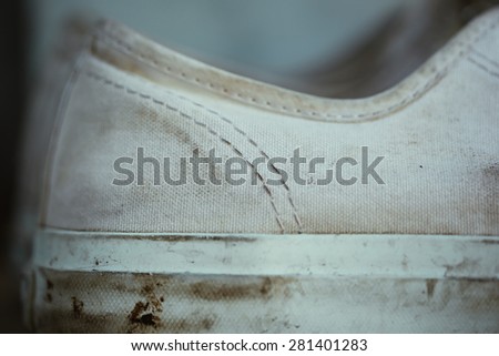 Close up of canvas shoe stitching