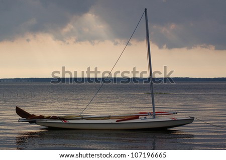 Sailboat anchored on inland waters in Virginia