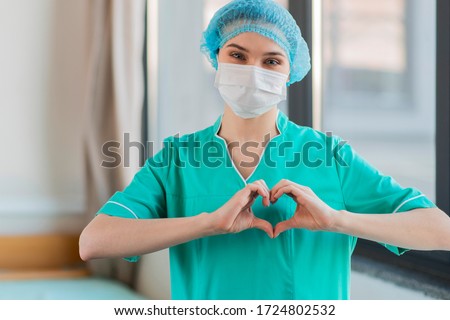 Nurse with hands heart shape  商業照片 © 