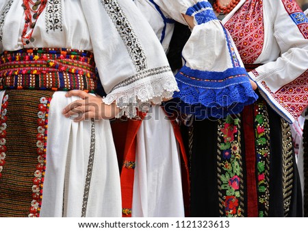 Beautiful traditional Romania costumes from Dobrogea , Romania Imagine de stoc © 